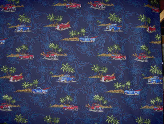 20kalaka Tropical Hawaiian Diamond Head, palms, surfboards & trucks on an aqua poplin apparel fabric..
