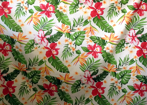 Vintage Style Hawaiian fabric print with  plumeria, orchids, and bird of paradise flowers - apparel weight cotton apparel fabric..