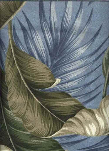 This 100% cotton upholstery tropical Hawaiian Bark cloth fabric is covered with palm and banana leaves in various tones of greens. This large print gives the illusion of falling leaves. It looks like it came right out of the art deco er during the 1950's. It is 55" wide with a repeat pattern of 24" This one has a blue background and it also is available in natural and black.
