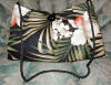 Handbag
Size: about 10" tall x 13" wide