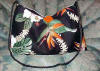 Handbag Size: about 10" tall x 13" wide