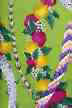70lole Tropical lei flowers on cotton broadcloth apparel fabric. 
